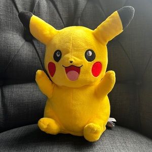 TOMY Pikachu with small bottom compartment